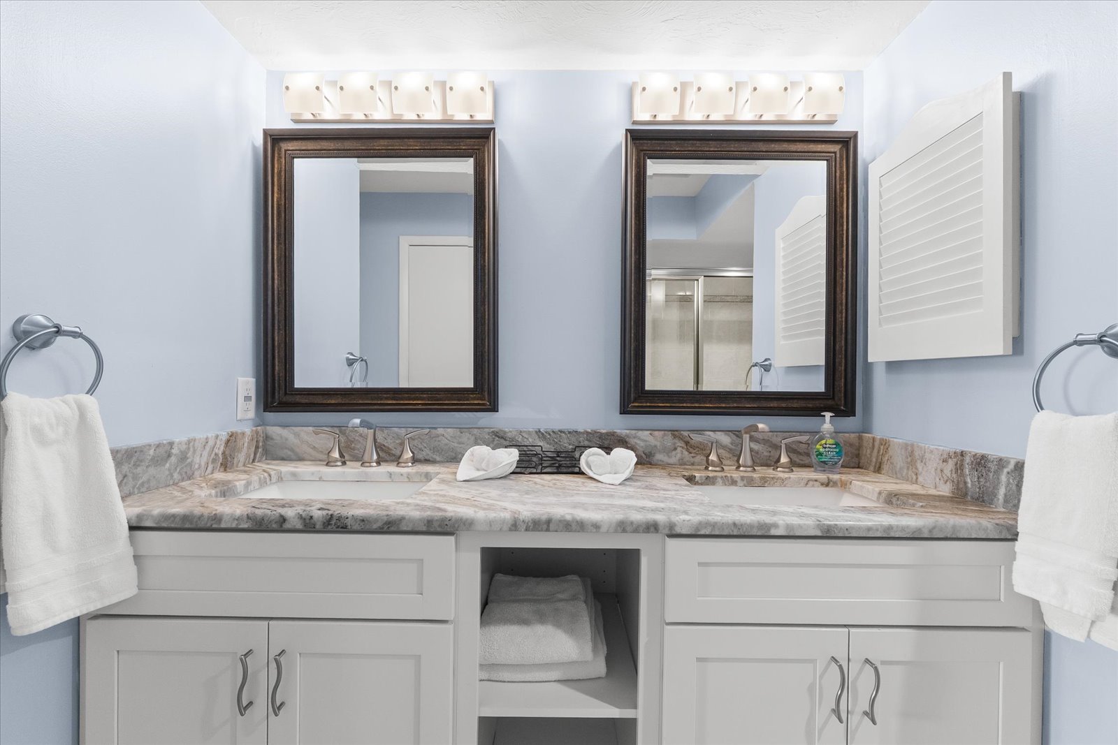 bright dining area with bay views inside Bayview Beauty Siesta Key