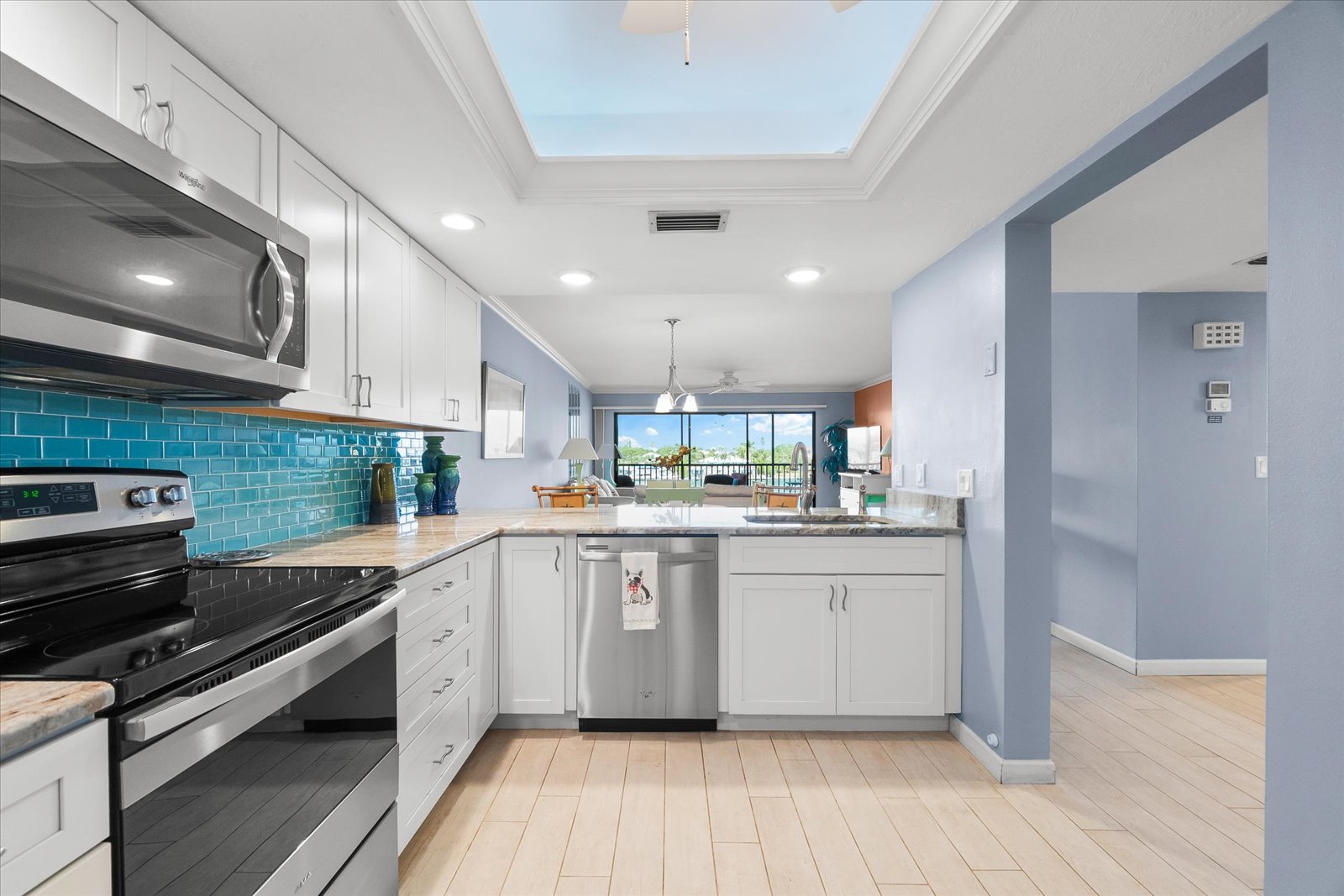 primary bathroom with double sinks and walk in shower inside Siesta Key condo