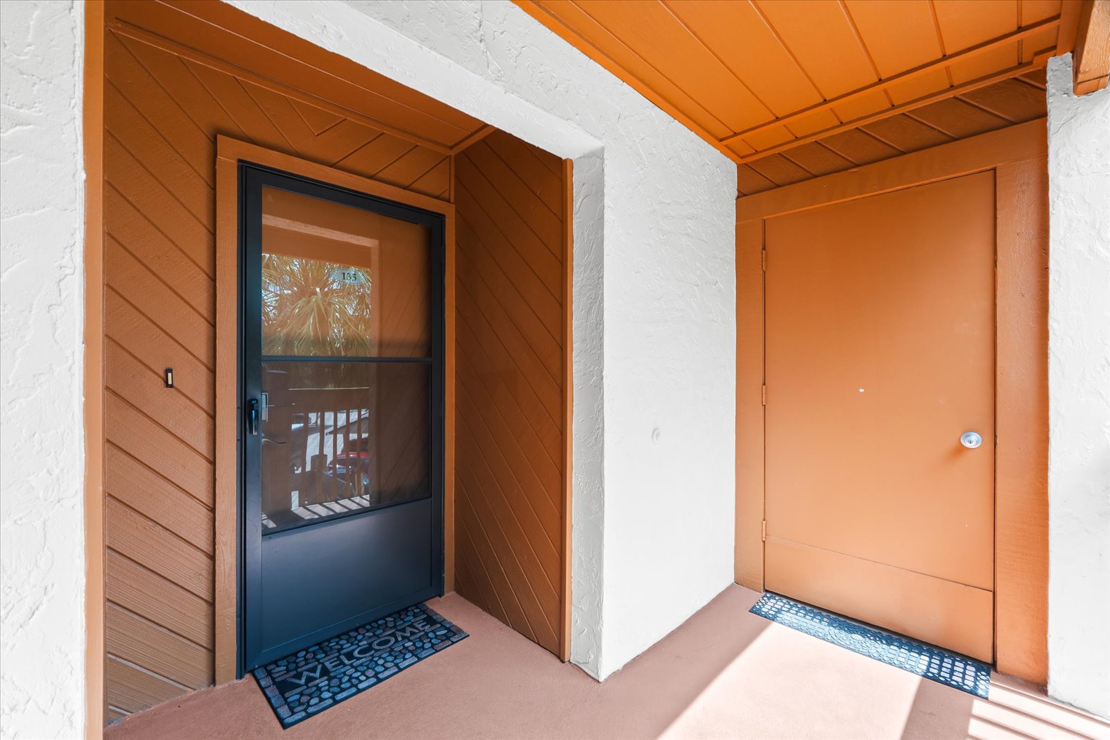 open coastal kitchen with granite counters and stainless appliances in Bayview Beauty condo