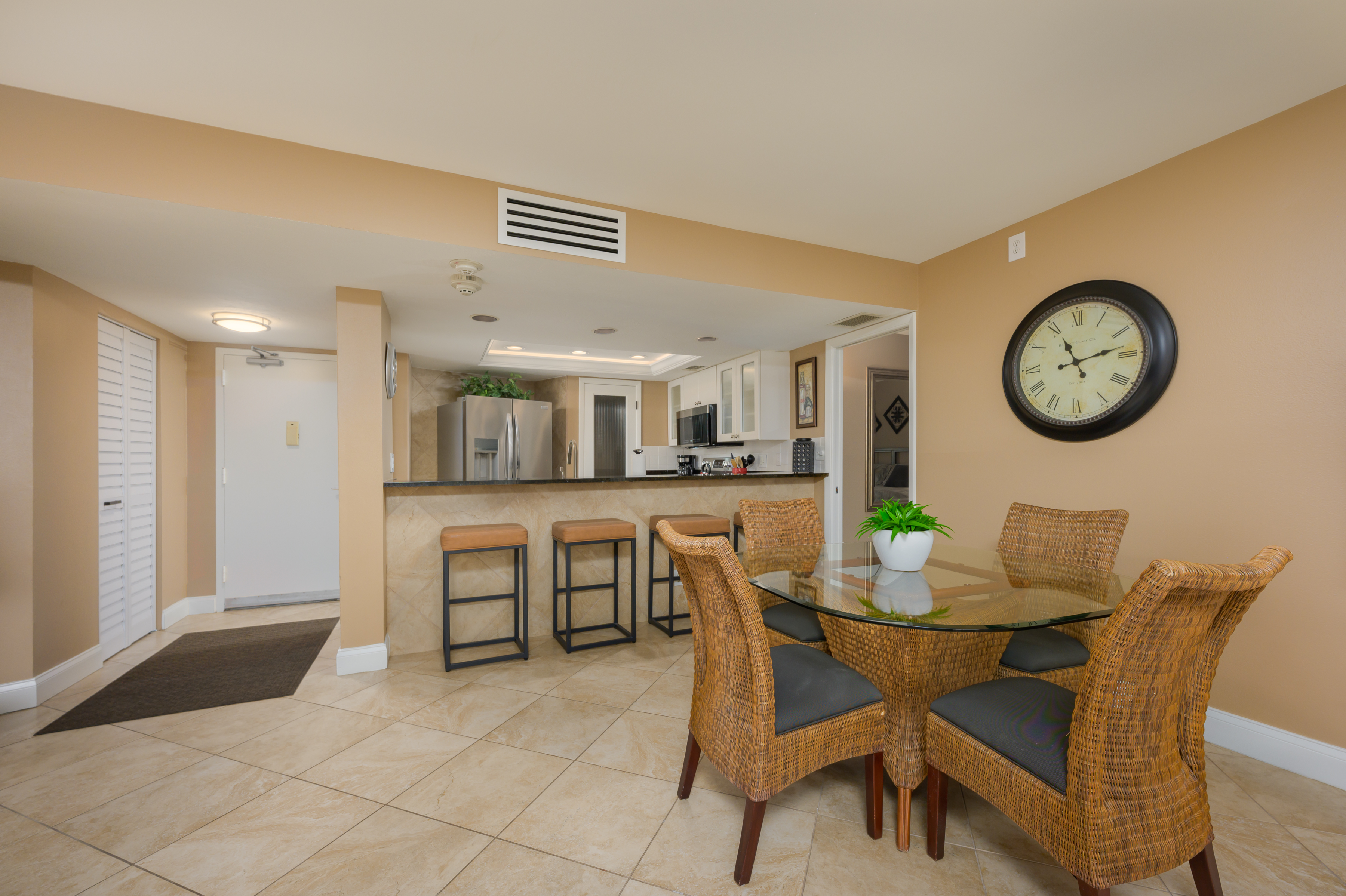 open dining and living room layout at Sarasota Surf and Racquet Club Tower 0104