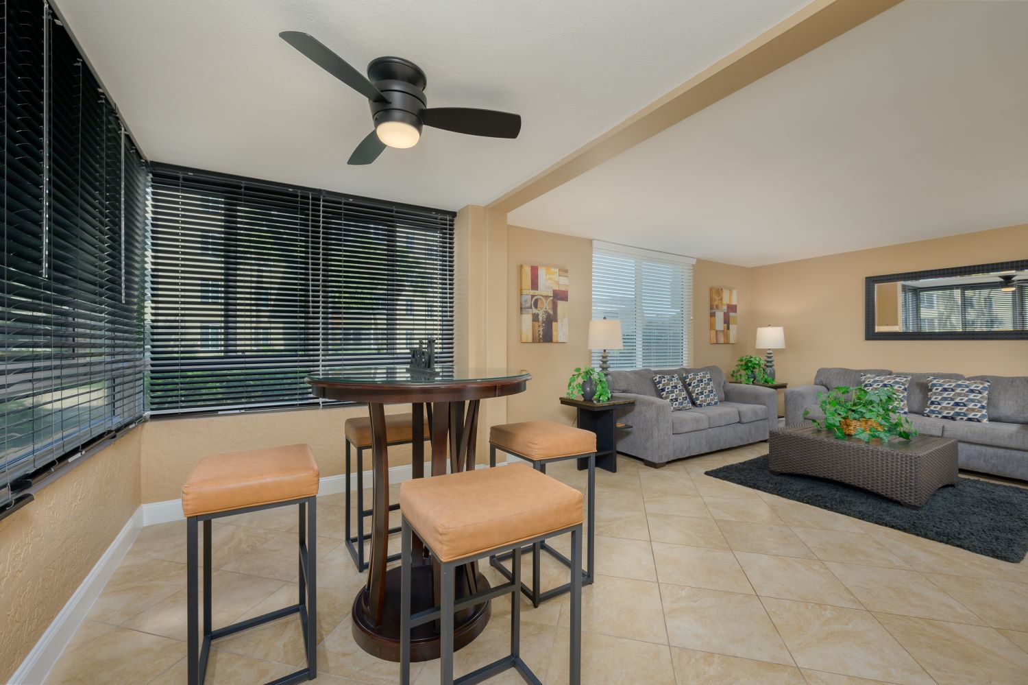 guest bedroom with two double beds and TV at Sarasota Surf and Racquet Club
